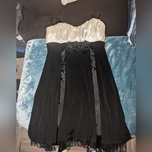 Beautiful brand new never worn dress size 13 beautiful flowing black sheen